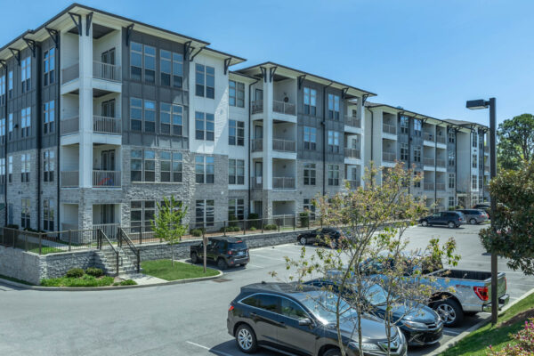 Residence at Old Hickory Lake apartments buildings with parking lot area.