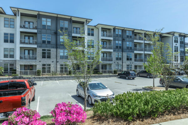Residence at Old Hickory Lake apartments buildings with greenery landscape and parking lot area.