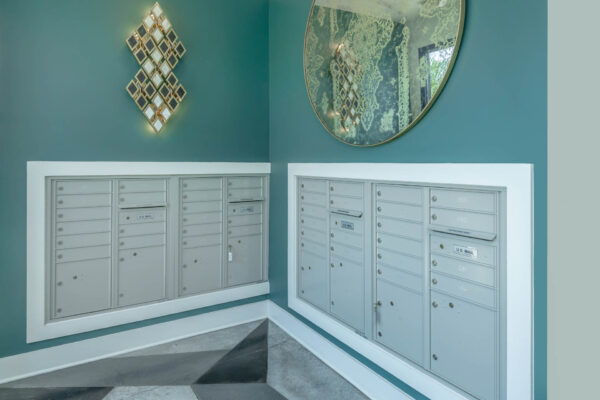 Residence at Old Hickory Lake apartments mailroom with large mirror.