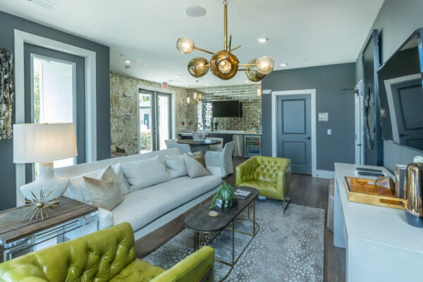 Residence at Old Hickory Lake apartments spacious lounge area featuring comfortable seating, entertainment and bar area.