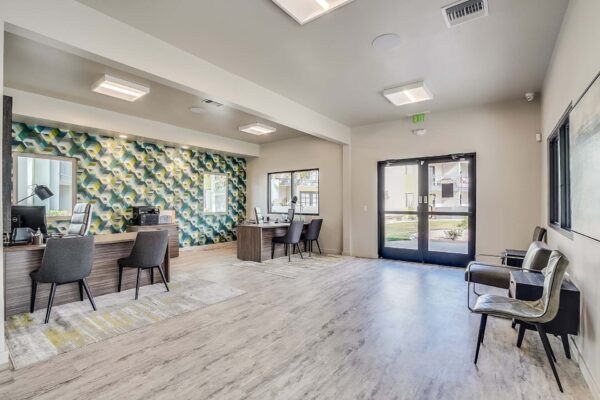 Tempe Vista apartments leasing office with comfortable seating and leasing desks.