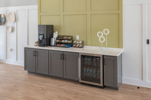 The Avery apartments coffee bar with coffee machine and drink fridge.