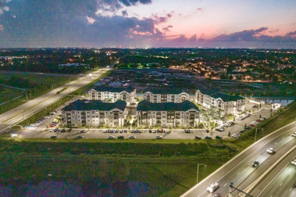 The Avery apartments with lush landscaping and ample parking.