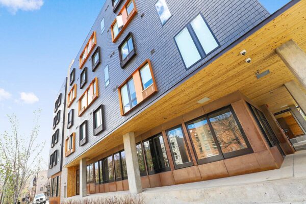 The Economist apartments with modern architecture and colorful construction.