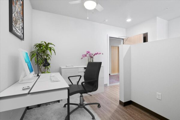 The Overland apartment den with computer desk.