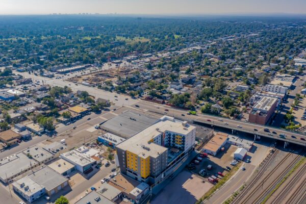 The Overland apartments with colorful modern construction and maple parking.