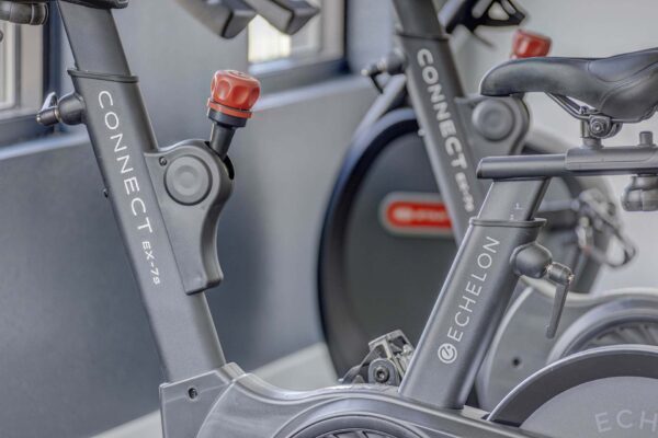 Copper 87 apartments fitness center with spin bikes.