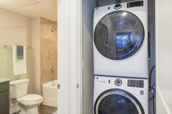 The Retreat at Patriot Park apartment bathroom and laundry closet.
