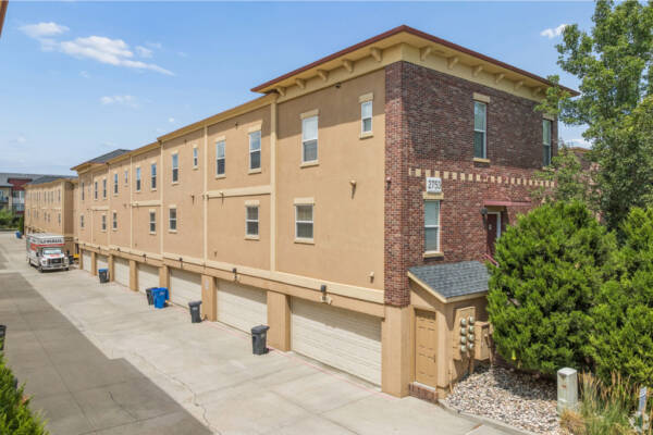 External shot of building with two car garage access